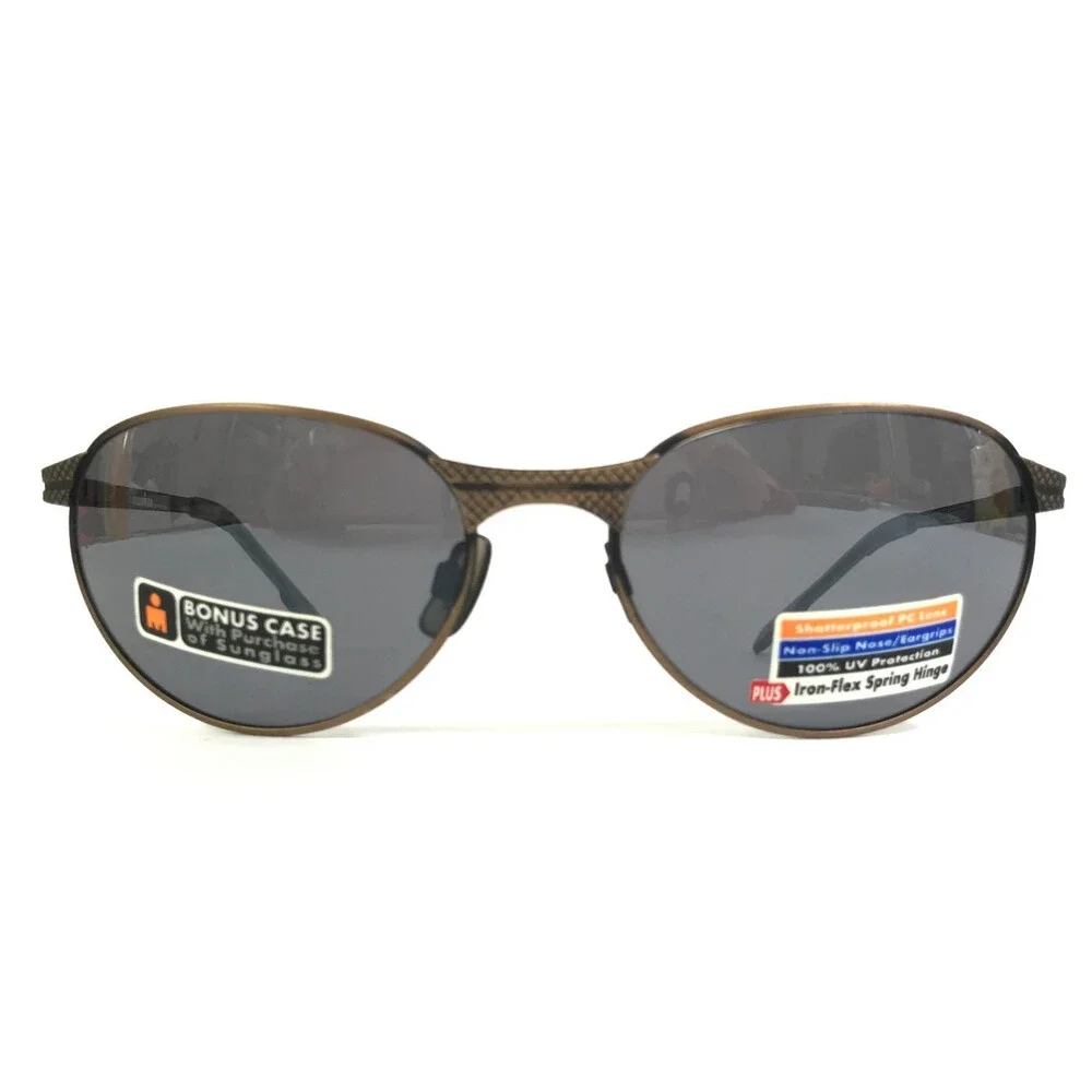 Foster Grant Sunglasses IRONMAN TL5-881 Gunmetal Gold Oval Frames w/ Gray Lenses